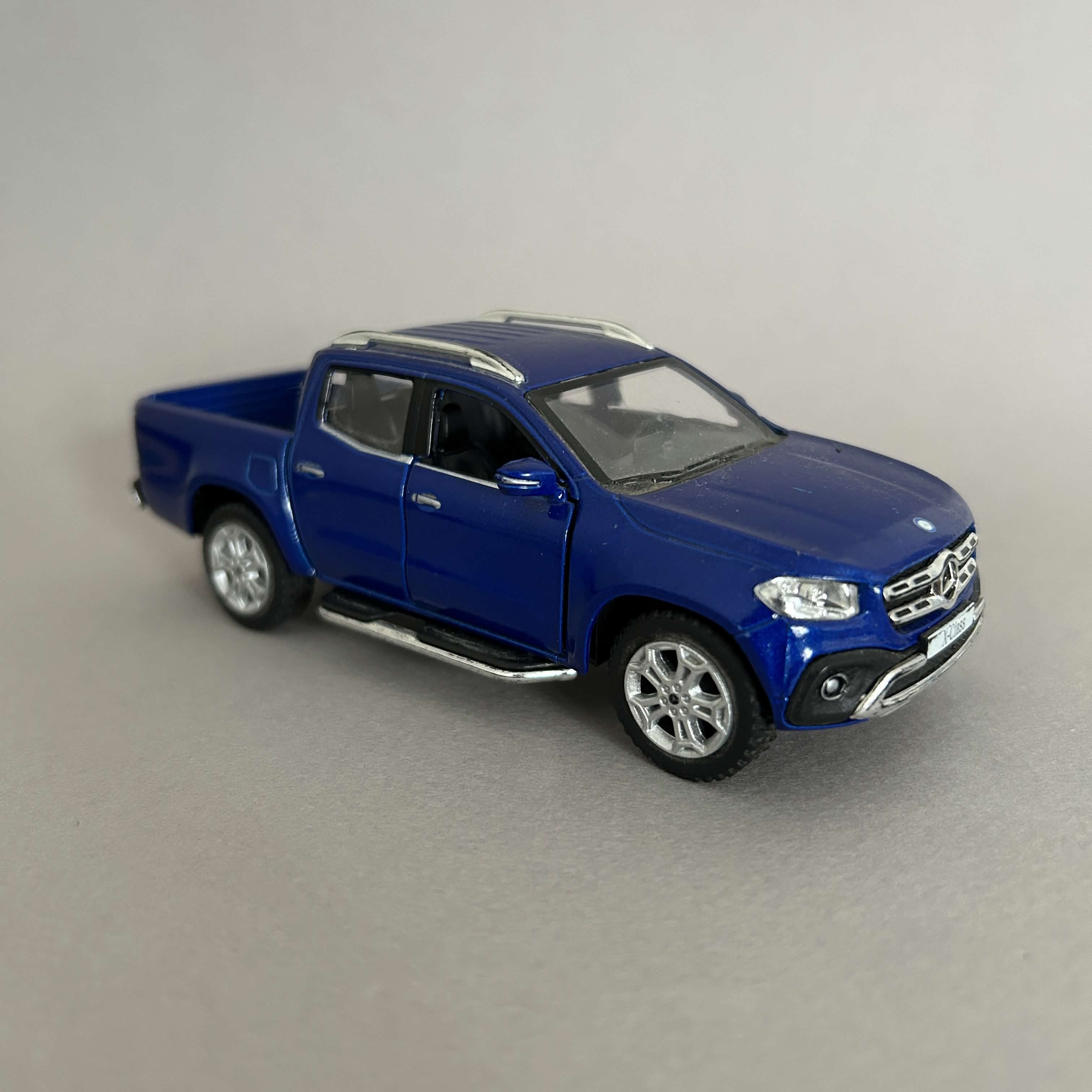 Passing cars as I wait for the light to change