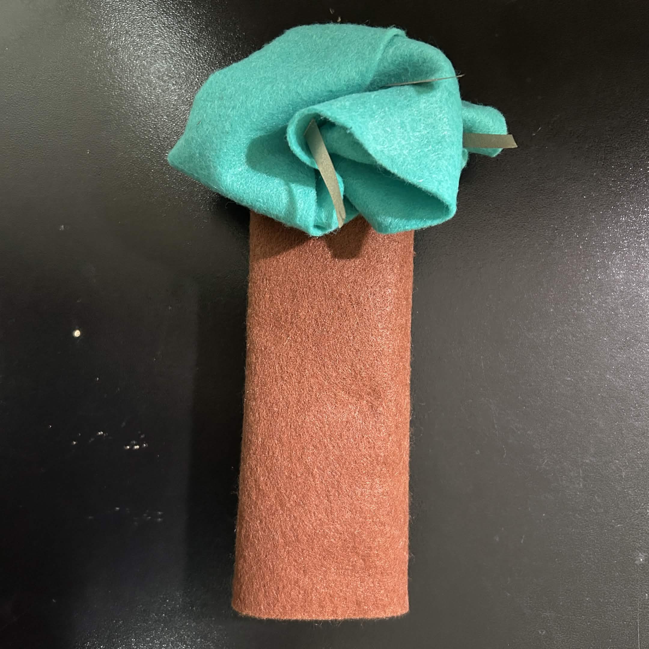 I recreated a version of the tree using felt anf condutive fabric.