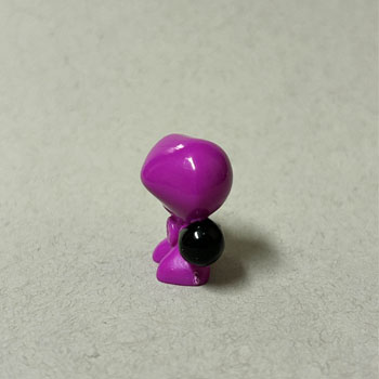 The toy’s body is rounded and smooth, making it easy to hold and manipulate.